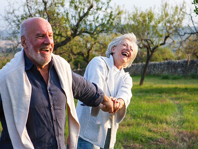 Spry Finance switch to Lifetime Loan - a couple enjoying retirement on a walk
