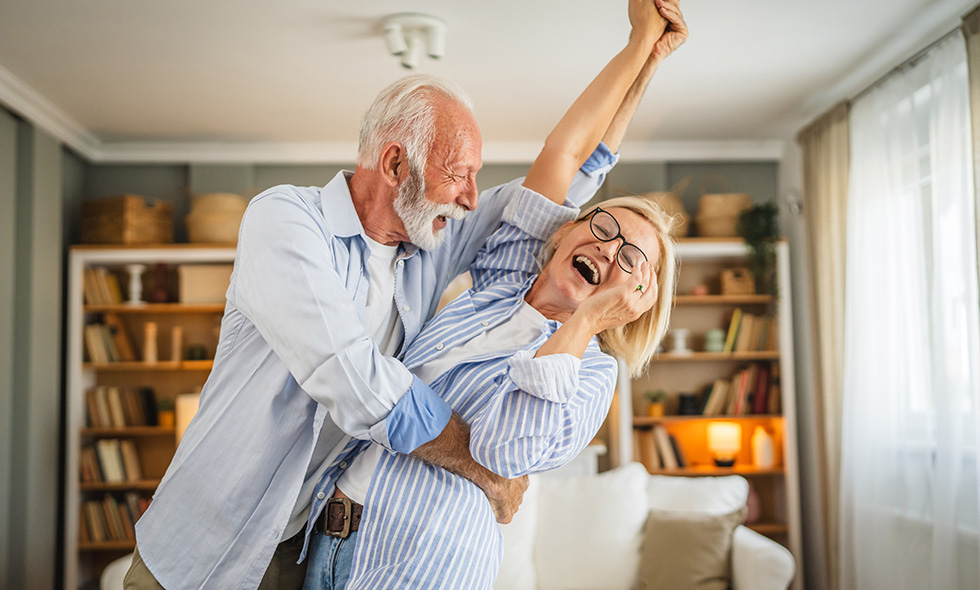 Spry Hub - Fitness at home - couple dancing in living room