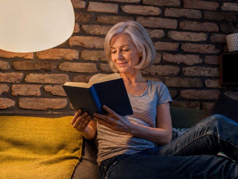 Spry Hub - featured lighting - person reading under a large lamp